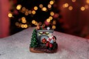 Decor de Craciun MagicHome, Mos Craciun cu un copil langa semineu, LED, interior, 10,5x7,8x9,4 cm, sellbox 12 buc