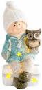 Figurină MagicHome Crăciun, Băiat stând pe un taburet cu o bufniță, 1 LED, polirășină, 10,5x10,5x19,5 cm